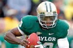 WACO, TX - DECEMBER 03: Robert Griffin III #10 of the Baylor Bears runs during a game against the Texas Longhorns at Floyd Casey Stadium on December 3, 2011 in Waco, Texas.  (Photo by Sarah Glenn/Getty Images)