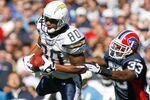 ORCHARD PARK, NY - OCTOBER 19:  Malcolm Floyd #80 of the San Diego Chargers makes a catch ahead of Jabari Greer #33 of the Buffalo Bills  on October 19, 2008 at Ralph Wilson Stadium in Orchard Park, New York. Buffalo won 23-14.  (Photo by Rick Stewart/Getty Images)