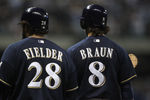 MILWAUKEE, WI - OCTOBER 10:  (L-R) Prince Fielder #28 and Ryan Braun #8 of the Milwaukee Brewers stand on the field against the St. Louis Cardinals during Game Two of the National League Championship Series at Miller Park on October 10, 2011 in Milwaukee, Wisconsin. The Cardinals won 12-3. (Photo by Jonathan Daniel/Getty Images)