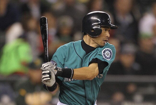 SEATTLE - SEPTEMBER 26:  Ichiro Suzuki #51 of the Seattle Mariners singles in the seventh inning against the Oakland Athletics at Safeco Field on September 26, 2011 in Seattle, Washington. (Photo by Otto Greule Jr/Getty Images)