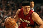 CHICAGO, IL - MAY 26:  Mike Bibby #0 of the Miami Heat drives against Derrick Rose #1 of the Chicago Bulls in Game Five of the Eastern Conference Finals during the 2011 NBA Playoffs on May 26, 2011 at the United Center in Chicago, Illinois. NOTE TO USER: User expressly acknowledges and agrees that, by downloading and or using this photograph, User is consenting to the terms and conditions of the Getty Images License Agreement.  (Photo by Jonathan Daniel/Getty Images)