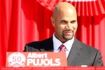 ANAHEIM, CA - DECEMBER 10:  Albert Pujols sits on the stage at a public press conference introducing newly signed Los Angeles Angels of Anaheim  players Pujols and C.J. Wilson at Angel Stadium on December 10, 2011 in Anaheim, California.  (Photo by Stephen Dunn/Getty Images)