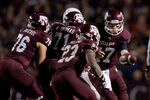COLLEGE STATION, TX - NOVEMBER 24:  Ryan Tannehill #17 of the Texas A&M Aggies looks to hand off against the Texas Longhorns in the second half of a game at Kyle Field on November 24, 2011 in College Station, Texas. (Photo by Darren Carroll/Getty Images)