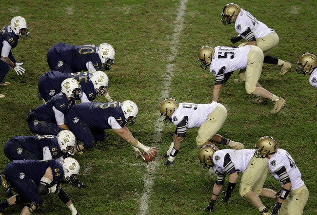 LANDOVER, MD - DECEMBER 10: The Navy Midshipmen offense lines up against the Army Black Knights during the second half at FedEx Field on December 10, 2011 in Landover, Maryland.  (Photo by Rob Carr/Getty Images)