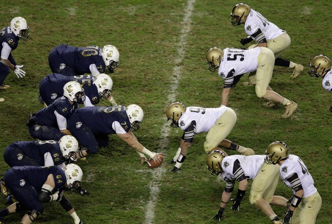 LANDOVER, MD - DECEMBER 10: The Navy Midshipmen offense lines up against the Army Black Knights during the second half at FedEx Field on December 10, 2011 in Landover, Maryland.  (Photo by Rob Carr/Getty Images)