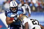 NASHVILLE, TN - DECEMBER 11:   Javon Ringer #21 of the Tennessee Titans is hit by Malcolm Jenkins #27 of the New Orleans Saints during a game against the Tennessee Titans at LP Field on December 11, 2011 in Nashville, Tennessee.  (Photo by Wesley Hitt/Getty Images)