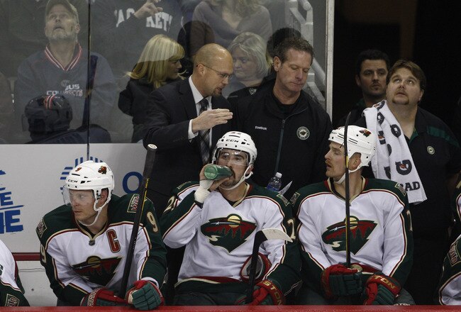 COLUMBUS, OH - NOVEMBER 15:  Minnesota Wild Head Coach Mike Yeo instructs his team during the game against the Columbus Blue Jackets at Nationwide Arena on November 15, 2011 in Columbus, Ohio.  The Wild defeated the Blue Jackets 4-2.  (Photo by John Grieshop/Getty Images)
