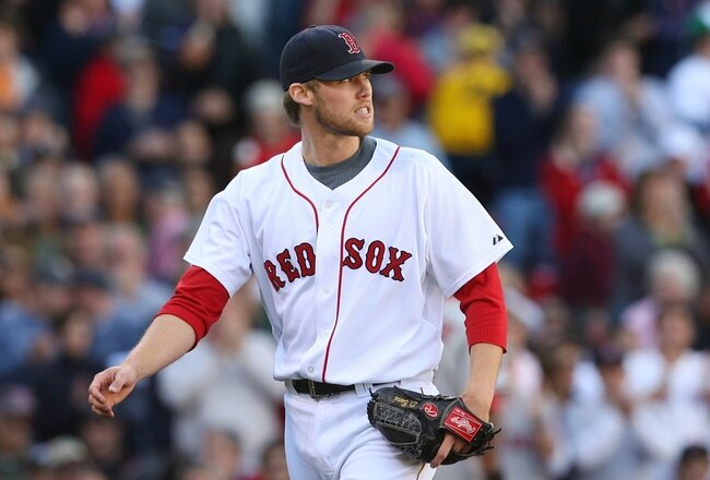 BOSTON - OCTOBER 11: Pitcher Daniel Bard #60 of the Boston Red Sox reacts after getting a double-play in the sixth inning against the Los Angeles Angels of Anaheim in Game Three of the ALDS during the 2009 MLB Playoffs at Fenway Park on October 11, 2009 in Boston, Massachusetts. (Photo by Jim Rogash/Getty Images)
