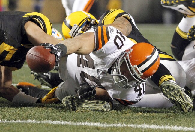 PITTSBURGH, PA - DECEMBER 8:   Peyton Hillis #40 of the Cleveland Browns stretches for the end zone but is stopped by the Pittsburgh Steelers defense during the game on December 8, 2011 at Heinz Field in Pittsburgh, Pennsylvania.  (Photo by Justin K. Aller/Getty Images)