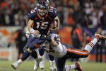 DENVER, CO - DECEMBER 11:  Quarterback Tim Tebow #15 of the Denver Broncos breaks a tackle by linebacker Brian Urlacher #54 of the Chicago Bears as he scrambles during the overtime period at Sports Authority Field at Mile High on December 11, 2011 in Denver, Colorado. The Broncos defeated the Bears 13-10.  (Photo by Doug Pensinger/Getty Images)