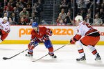 MONTREAL, CANADA - NOVEMBER 16:  Brian Gionta #21 of the Montreal Canadiens skates with the puck while being defended by Tomas Kaberle #51 of the Carolina Hurricanes during the NHL game at the Bell Centre on November 16, 2011 in Montreal, Quebec, Canada.  The Canadiens defeated the Hurricanes 4-0.  (Photo by Richard Wolowicz/Getty Images)