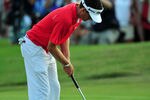 JOHNS CREEK, GA - AUGUST 14:  Keegan Bradley holes his par putt on the third playoff hole during the final round of the 93rd PGA Championship at the Atlanta Athletic Club on August 14, 2011 in Johns Creek, Georgia.  (Photo by Stuart Franklin/Getty Images)