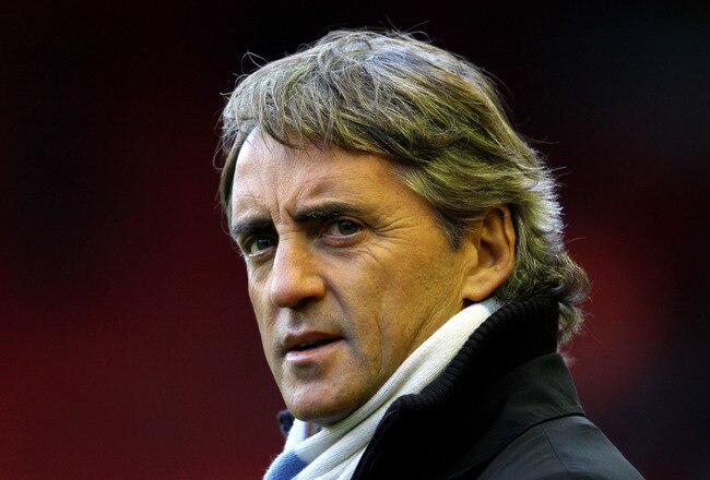 LIVERPOOL, ENGLAND - NOVEMBER 27:  Manchester City Manager Roberto Mancini looks on prior to the Barclays Premier League match between Liverpool and Manchester City at Anfield on November 27, 2011 in Liverpool, England. (Photo by Alex Livesey/Getty Images)