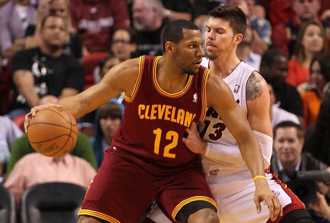MIAMI, FL - JANUARY 31: Joey Graham #12 of the Cleveland Cavaliers posts up Mike Miller #13 of the Miami Heat  during a game at American Airlines Arena on January 31, 2011 in Miami, Florida. NOTE TO USER: User expressly acknowledges and agrees that, by downloading and/or using this Photograph, User is consenting to the terms and conditions of the Getty Images License Agreement.  (Photo by Mike Ehrmann/Getty Images)