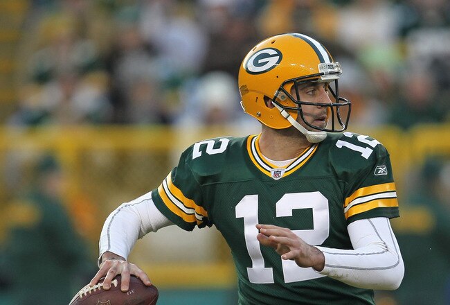 GREEN BAY, WI - DECEMBER 11: Aaron Rodgers #12 of the Green Bay Packers throws a pass against the Oakland Raiders at Lambeau Field on December 11, 2011 in Green Bay, Wisconsin. (Photo by Jonathan Daniel/Getty Images)