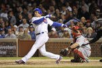 CHICAGO, IL - SEPTEMBER 07:  Aramis Ramirez #16 of the Chicago Cubs follows through on a two-RBI double scoring teammates Starlin Castro #13 and Reed Johnson #5 during the sixth inning against the Cincinnati Reds at Wrigley Field on September 7, 2011 in Chicago, Illinois.  (Photo by Brian Kersey/Getty Images)