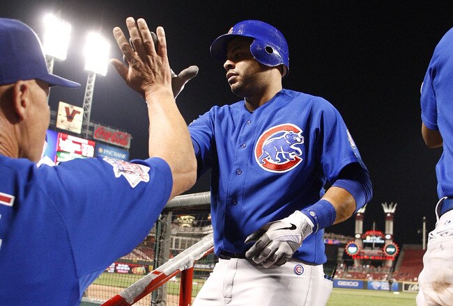 CINCINNATI, OH - SEPTEMBER 12:   Aramis Ramirez #16 of the Chicago Cubs receives congratulations after hitting a home run during the game against the Cincinnati Reds on September 12, 2011 at Great American Ball Park in Cincinnati, Ohio.  The Cubs defeated the Reds 12-8.  (Photo by John Grieshop/Getty Images)