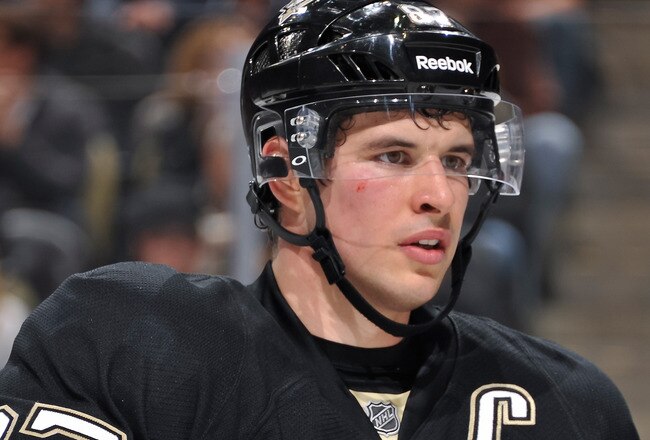 PITTSBURGH, PA - DECEMBER 5:  Sidney Crosby #87 of the Pittsburgh Penguins waits for a face off against the Boston Bruins on December 5, 2011 at CONSOL Energy Center in Pittsburgh, Pennsylvania.  (Photo by Jamie Sabau/Getty Images)