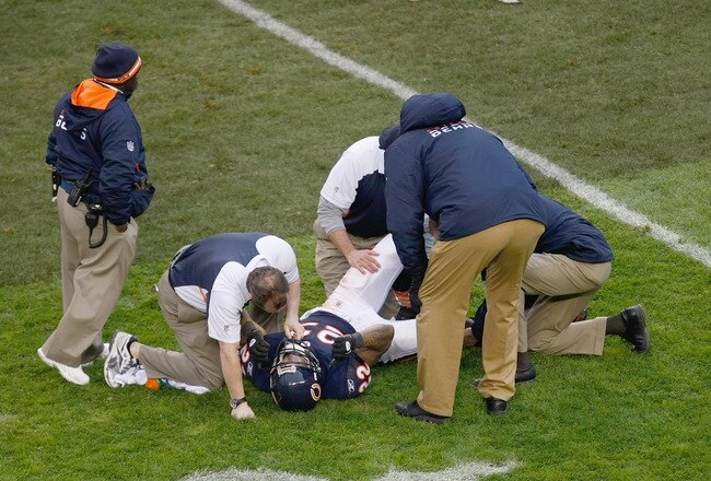 CHICAGO, IL - DECEMBER 4: Matt Forte #22 of the Chicago Bears lays on the field after being injured on a hit by Derrick Johnson #56 of the Kansas City Chiefs at Soldier Field on December 4, 2011 in Chicago, Illinois. (Photo by Scott Boehm/Getty Images)
