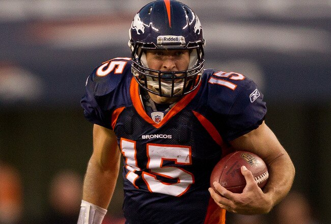 DENVER, CO - DECEMBER 11:  Quarterback Tim Tebow #15 of the Denver Broncos runs with the ball against the Chicago Bears at Sports Authority Field at Mile High on December 11, 2011 in Denver, Colorado. (Photo by Justin Edmonds/Getty Images)
