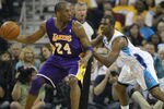 NEW ORLEANS - APRIL 24:  Chris Paul #3 of the New Orleans Hornets guards Kobe Bryant #24 of the Los Angeles Lakers in Game Four of the Western Conference Quarterfinals in the 2011 NBA Playoffs at New Orleans Arena on April 24, 2011 in New Orleans, Louisiana. NOTE TO USER: User expressly acknowledges and agrees that, by downloading and or using this Photograph, user is consenting to the terms and conditions of the Getty Images License Agreement.  (Photo by Jeff Zelevansky/Getty Images)
