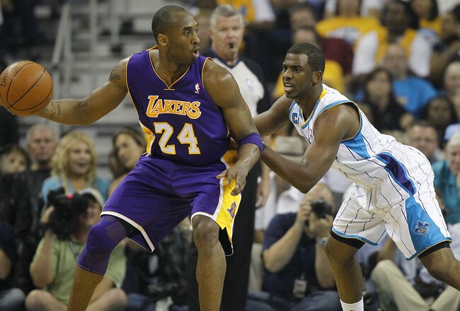 NEW ORLEANS - APRIL 24:  Chris Paul #3 of the New Orleans Hornets guards Kobe Bryant #24 of the Los Angeles Lakers in Game Four of the Western Conference Quarterfinals in the 2011 NBA Playoffs at New Orleans Arena on April 24, 2011 in New Orleans, Louisiana. NOTE TO USER: User expressly acknowledges and agrees that, by downloading and or using this Photograph, user is consenting to the terms and conditions of the Getty Images License Agreement.  (Photo by Jeff Zelevansky/Getty Images)