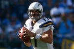 SAN DIEGO , CA - SEPTEMBER 20:  Quarterback Philip Rivers #17 of the San Diego Chargers looks down field for an open receiver against the Baltimore Ravens in the fourth quarter at Qualcomm Stadium on September 20, 2009 in San Diego, California. The Ravens defeated the Chargers 31-26.  (Photo by Jeff Gross/Getty Images)