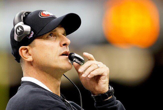 NEW ORLEANS, LA - AUGUST 12: Head Coach Jim Harbaugh of the San Francisco 49ers looks on as his team plays the New Orleans Saints during a preseason game at Louisiana Superdome on August 12, 2011 in New Orleans, Louisiana.  (Photo by Sean Gardner/Getty Images)