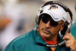 ARLINGTON, TX - NOVEMBER 24:  Head coach Tony Sparano of the Miami Dolphins leads his team against the Dallas Cowboys during the Thanksgiving Day game at Cowboys Stadium on November 24, 2011 in Arlington, Texas.  (Photo by Tom Pennington/Getty Images)