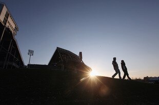 STATE COLLEGE, PA - NOVEMBER 12:  Penn State fans walk away from Beaver Stadium after the NCAA football game between Penn State and Nebraska in the wake of the Jerry Sandusky scandal on November 12, 2011 in State College, Pennsylvania.  Penn State lost their final home game 17-14. Penn State head football coach Joe Paterno was fired amid allegations that former Penn State defensive coordinator Jerry Sandusky was involved with child sex abuse.   (Photo by Mario Tama/Getty Images)