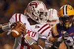 BATON ROUGE, LA - NOVEMBER 12:  Kawaun Jakes #6 of the Western Kentucky Hilltoppers looks to throw a pass against the Louisiana State University Tigers at Tiger Stadium on November 12, 2011 in Baton Rouge, Louisiana.  (Photo by Chris Graythen/Getty Images)