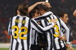 ROME, ITALY - DECEMBER 12:  Giorgio Chiellini (R) of Juventus celebrates his penalty equaliser with Andrea Pirlo, Alessandro Matri and team-mates during the Serie A match between AS Roma and Juventus FC at Stadio Olimpico on December 12, 2011 in Rome, Italy.  (Photo by Paolo Bruno/Getty Images)