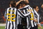 ROME, ITALY - DECEMBER 12:  Giorgio Chiellini (R) of Juventus celebrates his penalty equaliser with Andrea Pirlo, Alessandro Matri and team-mates during the Serie A match between AS Roma and Juventus FC at Stadio Olimpico on December 12, 2011 in Rome, Italy.  (Photo by Paolo Bruno/Getty Images)
