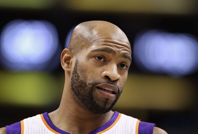 PHOENIX, AZ - FEBRUARY 13:  Vince Carter #25 of the Phoenix Suns awaits a free throw shot during the NBA game against the Sacramento Kings at US Airways Center on February 13, 2011 in Phoenix, Arizona. The Kings defeated the Suns 113-108.  NOTE TO USER: User expressly acknowledges and agrees that, by downloading and or using this photograph, User is consenting to the terms and conditions of the Getty Images License Agreement.  (Photo by Christian Petersen/Getty Images)