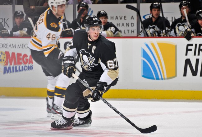 PITTSBURGH, PA - DECEMBER 5:  Sidney Crosby #87 of the Pittsburgh Penguins skates against the Boston Bruins on December 5, 2011 at CONSOL Energy Center in Pittsburgh, Pennsylvania.  (Photo by Jamie Sabau/Getty Images)