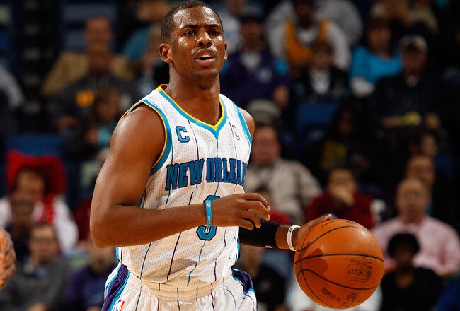 NEW ORLEANS, LA - JANUARY 03:  Chris Paul #3 of the New Orleans Hornets moves the ball in the first half against the Philadelphia 76ers at New Orleans Arena on January 3, 2011 in New Orleans, Louisiana. NOTE TO USER: User expressly acknowledges and agrees that, by downloading and/or using this photograph, User is consenting to the terms and conditions of the Getty Images License Agreement.  (Photo by Chris Graythen/Getty Images)