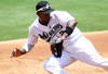 MIAMI GARDENS, FL - JULY 10:  Hanley Ramirez #2  of the Florida Marlins makes a play against the Houston Astros at Sun Life Stadium on July 10, 2011 in Miami Gardens, Florida.  (Photo by Marc Serota/Getty Images)