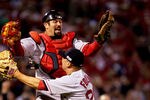 ST LOUIS - OCTOBER 27:  Jason Varitek #33 and Keith Foulke #29 of the Boston Red Sox celebrate after defeating the St. Louis Cardinals 3-0 in game four of the World Series on October 27, 2004 at Busch Stadium in St. Louis, Missouri.(Photo by Jed Jacobsohn/Getty Images)