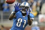 DETROIT, MI - NOVEMBER 24: Calvin Johnson #81 of the Detroit Lions warms up prior to the start of the game against the Green Bay Packers at Ford Field on November 24, 2011 in Detroit, Michigan.  (Photo by Leon Halip/Getty Images)