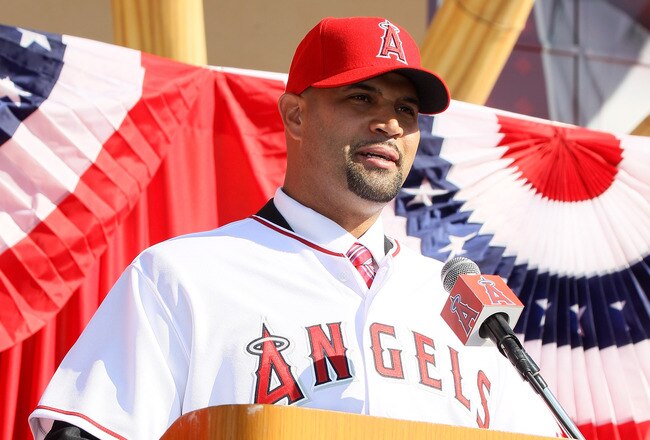 ANAHEIM, CA - DECEMBER 10:  Albert Pujols speaks at a public press conference introducing newly signed Los Angeles Angels of Anaheim  players Pujols and C.J. Wilson at Angel Stadium on December 10, 2011 in Anaheim, California.  (Photo by Stephen Dunn/Getty Images)