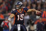 DENVER, CO - DECEMBER 11:  Quarterback Tim Tebow #15 of the Denver Broncos delivers a pass against the Chicago Bears at Sports Authority Field at Mile High on December 11, 2011 in Denver, Colorado. The Broncos defeated the Bears 13-10 in overtime.  (Photo by Doug Pensinger/Getty Images)