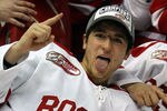 WASHINGTON - APRIL 11:  Corey Trivino #9 of the Boston Terriers celebrates the win over the Miami Red Hawks during the NCAA Men's Frozen Four Championship game on April 11, 2009 at the Verizon Center in Washington, DC. Boston defeated Miami 4-3 in overtime to win the national title.  (Photo by Elsa/Getty Images)