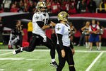 ATLANTA, GA - NOVEMBER 13: Chase Daniel #10 of the New Orleans Saints celebrates after John Kasay #2 kicks the game-winning field goal in overtime against the Atlanta Falcons at the Georgia Dome on November 13, 2011 in Atlanta, Georgia. (Photo by Scott Cunningham/Getty Images)