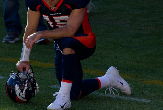 DENVER, CO - DECEMBER 11:  Quarterback Tim Tebow #15 of the Denver Broncos prays on the field prior to a game against the Chicago Bears at Sports Authority Field at Mile High on December 11, 2011 in Denver, Colorado. (Photo by Justin Edmonds/Getty Images)
