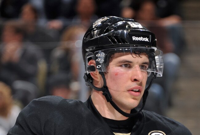 PITTSBURGH, PA - DECEMBER 5:  Sidney Crosby #87 of the Pittsburgh Penguins waits for a face off against the Boston Bruins on December 5, 2011 at CONSOL Energy Center in Pittsburgh, Pennsylvania.  (Photo by Jamie Sabau/Getty Images)