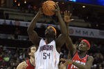 CHARLOTTE, NC - FEBRUARY 11:  Teammates Kris Humphries #43 and Anthony Morrow #22 of the New Jersey Nets try to stop Kwame Brown #54 of the Charlotte Bobcats during their game at Time Warner Cable Arena on February 11, 2011 in Charlotte, North Carolina. NOTE TO USER: User expressly acknowledges and agrees that, by downloading and/or using this Photograph, User is consenting to the terms and conditions of the Getty Images License Agreement.  (Photo by Streeter Lecka/Getty Images)
