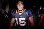 DENVER, CO - DECEMBER 11:  Quarterback Tim Tebow #15 of the Denver Broncos walks off the field after winning in overtime against the Chicago Bears at Sports Authority Field at Mile High on December 11, 2011 in Denver, Colorado. The Broncos defeated the Bears 13-10 in overtime. (Photo by Justin Edmonds/Getty Images)