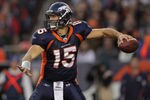 DENVER, CO - DECEMBER 11:  Quarterback Tim Tebow #15 of the Denver Broncos delivers a pass against the Chicago Bears at Sports Authority Field at Mile High on December 11, 2011 in Denver, Colorado. The Broncos defeated the Bears 13-10 in overtime.  (Photo by Doug Pensinger/Getty Images)