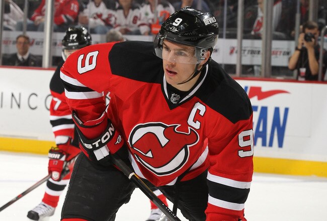 NEWARK, NJ - NOVEMBER 26: Zach Parise #9 of the New Jersey Devils  in action against the New York Islanders on November 26, 2011 at The Prudential Center in Newark, New Jersey  (Photo by Al Bello/Getty Images)