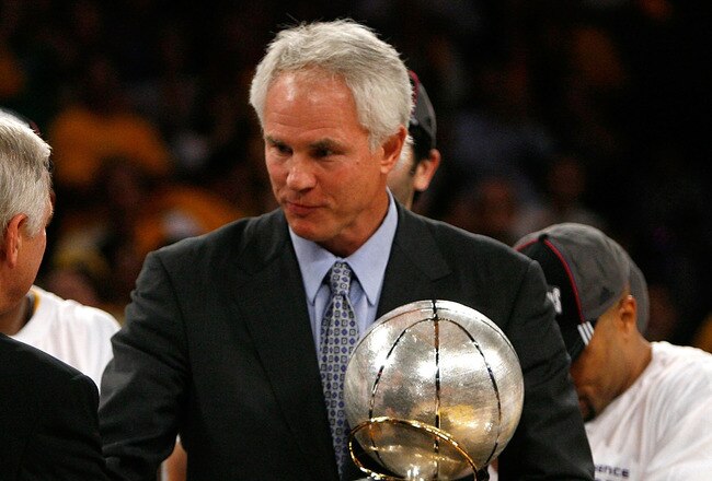 LOS ANGELES, CA - MAY 29:  (L-R) NBA legend Jerry West shakes hands with Los Angeles Lakers general manager Mitch Kupchak after defeating the Lakers defeated the San Antonio Spurs 100-92 in Game Five of the Western Conference Finals during the 2008 NBA Playoffs on May 29, 2008 at Staples Center in Los Angeles, California.  NOTE TO USER: User expressly acknowledges and agrees that, by downloading and/or using this Photograph, user is consenting to the terms and conditions of the Getty Images License Agreement.  (Photo by Jeff Gross/Getty Images)